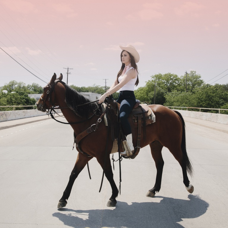 KACEY MUSGRAVES PARTNERS WITH LUCCHESE BOOTS.