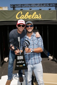 "LAS VEGAS, NEVADA - APRIL 02:  Singers Justin Moore (L) and Luke Bryan attend Cabela's & Academy of Country Music Celebrity Archery Tournament during the 4th ACM Party for a Cause Festival at at the Las Vegas Festival Grounds on April 2, 2016 in Las Vegas, Nevada.  (Photo by Isaac Brekken/Getty Images for ACM)"
