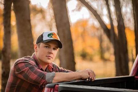 NEWCOMER TRAVIS DENNING SET TO JOIN JUSTIN MOORE ON TOUR.